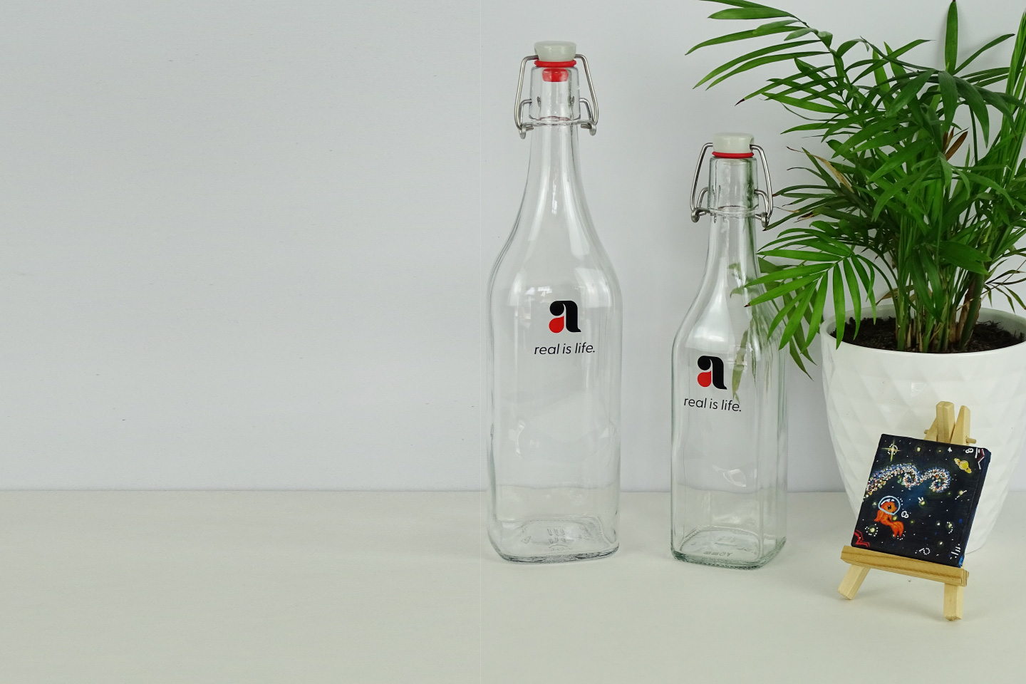 avakuk-glasflasche-personalisiert-tanpondruck-gravur glasflasche 1 liter und 1/2 liter